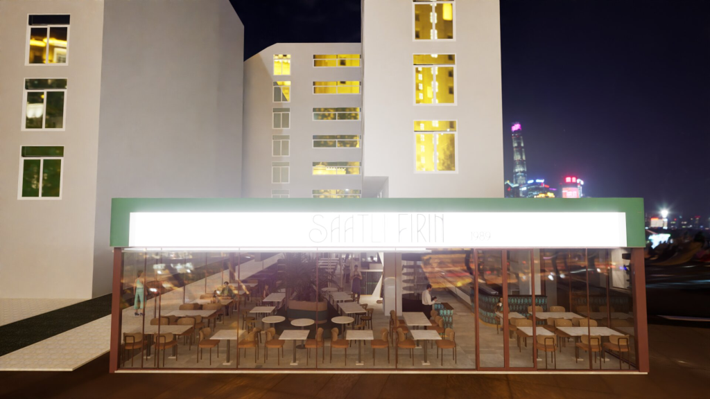 Aydınlatılmış cam restoran cephesi ve Saatli Fırın tabelası
